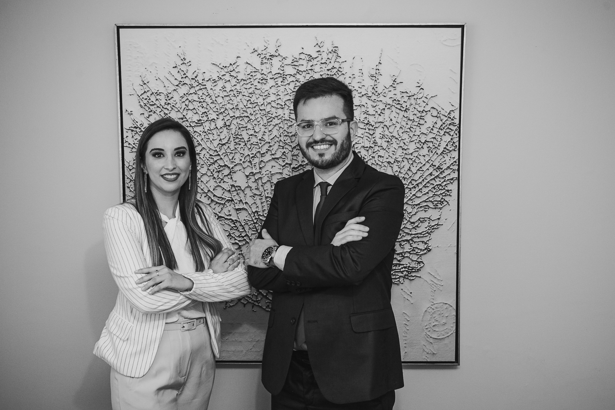 Hemerson e Helenis juntos em um registro da trajetória do escritório